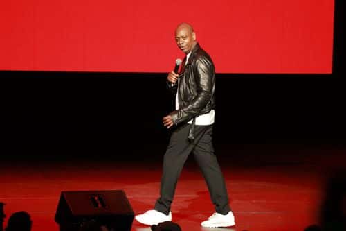 Dave Chappelle performs during a midnight pop-up show at Radio City Music Hall on October 16, 2022 in New York City.