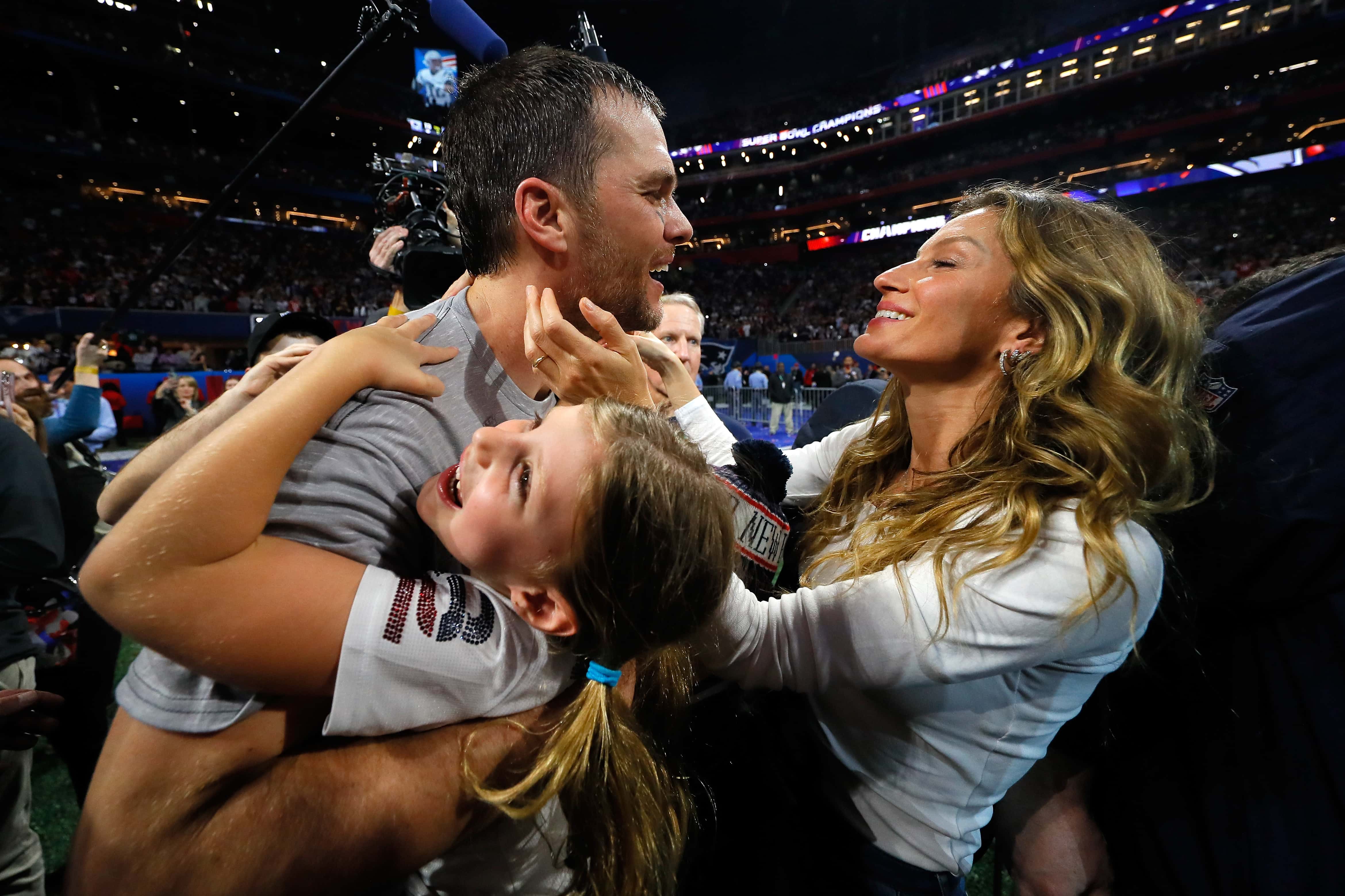 Tom Brady #12 of the New England Patriots celebrates with his wife Gisele Bündchen after the Super Bowl LIII against the Los Angeles Rams at Mercedes-Benz Stadium on February 3, 2019 in Atlanta, Georgia. The New England Patriots defeat the Los Angeles Rams 13-3.