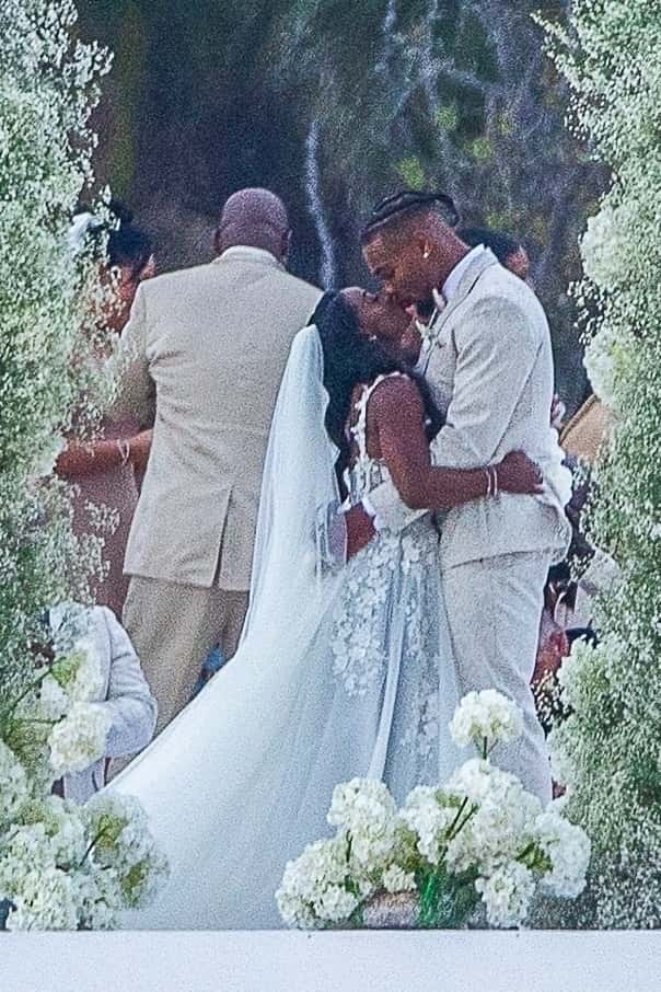 Family and friends were present as the couple exchanged vows in front of a stunning altar composed of greenery and white flowers (Backgrid)
