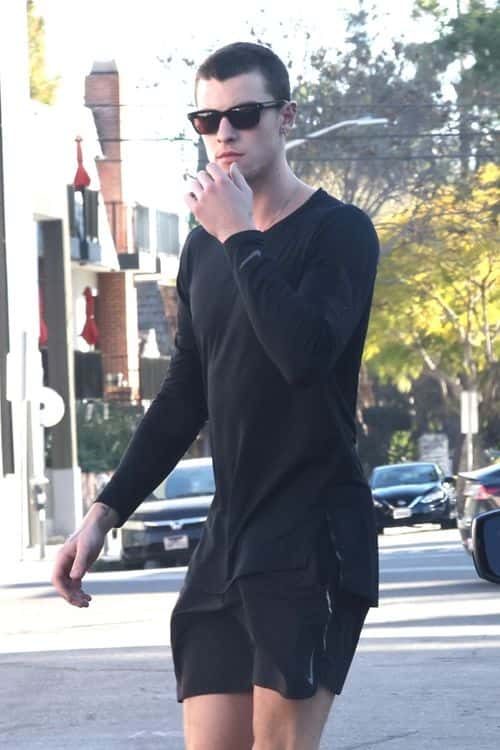 Shawn Mendes spotted in West Hollywood sporting all black and his new buzzcut (Backgrid)