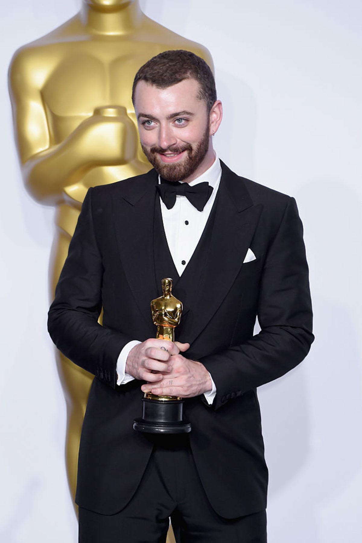 Sam Smith, winner of the Best Original Song award for 'Writing's on the Wall' from 'Spectre,' at the 88th Annual Academy Awards on February 28, 2016 in Hollywood, California. (Photo by Jeff Kravitz/FilmMagic)