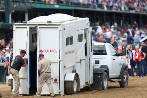 Here Mi Song is lead into a equine ambulance after racing in the tenth race ahead of the 149th running of the Kentucky Derby at Churchill Downs on May 06, 2023 in Louisville, Kentucky.