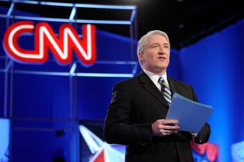 CNN correspondent John King talks to the audience before moderating a debate sponsored by CNN and the Republican Party of Arizona at the Mesa Arts Center between Republican presidential candidates U.S. Rep. Ron Paul (R-TX), former U.S. Sen. Rick Santorum, former Massachusetts Gov. Mitt Romney and former Speaker of the House Newt Gingrich on February 22, 2012 in Mesa, Arizona. The debate is the last one scheduled before voters head to the polls in Michigan and Arizona's primaries on February 28 and Super Tuesday on March 6.