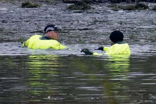 Emergency workers continue the search for further victims after a number of children fell through ice on a lake, on December 12, 2022 at Babbs Mill Park in Solihull, England. Three boys aged eight, 10 and 11 have died after falling through an icy lake last night. The search continued for more potential victims, following reports more children were present on the ice at the time of the incident.