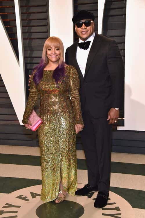 Simone Smith (L) and recording artist LL Cool J  attends the 2017 Vanity Fair Oscar Party hosted by Graydon Carter at Wallis Annenberg Center for the Performing Arts on February 26, 2017 in Beverly Hills, California.