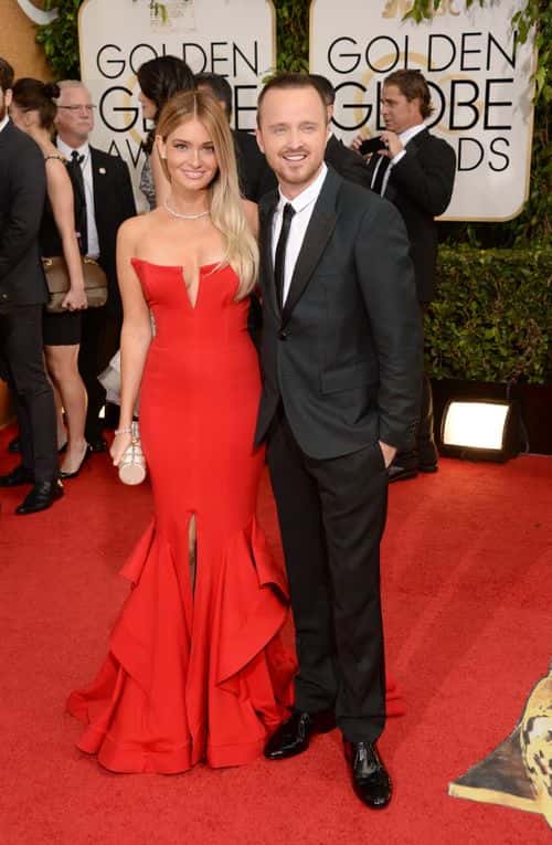 Actor Aaron Paul (R) and wife Lauren Parsekian attend the 71st Annual Golden Globe Awards held at The Beverly Hilton Hotel on January 12, 2014 in Beverly Hills, California.